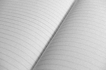 close-up shot, white papers, high-resolution, open notebook, lined pages, stationery concepts, blank pages, notebook details, paper texture, writing surface, office supplies