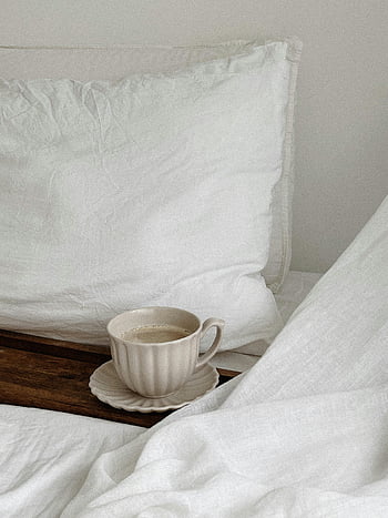 coffee cup, bed, white linens, wooden tray, cozy morning, warm coffee, pillow, comfort, bedroom, morning vibe, relaxation