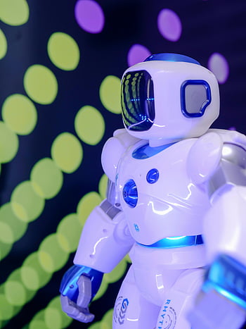 Blue and White Miniature Toy Robot, futuristic robot, glowing lights, high-tech design, vibrant background, close-up, toy robot, futuristic design, glowing robot, high-tech robot, vibrant lights