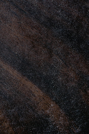 dust, close-up, dark surface, textured background, visible dust, design use, abstract texture, macro shot, grunge texture, dust particles, dark background