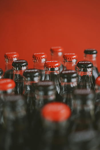 Coca-Cola, bottle tops, red caps, red background, close-up, soda bottles, closed bottles, Coca-Cola bottles, beverage bottles, glass bottles, soft drinks