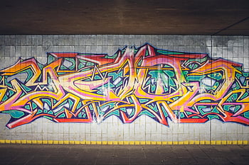 arte di strada, graffiti, muro di cemento, contesto urbano, colorato, pittura astratta, rosso giallo blu, arte urbana, arte muraria, murale di strada, graffiti urbani