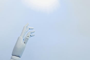robotic hand, white background, bright light, innovation, technology, futuristic, artificial intelligence, robotic arm, modern design, automation, robotics