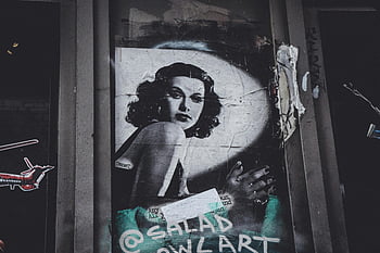 black and white portrait, street art, vintage style, city wall, artistic poster, woman's portrait, urban art, monochrome photography, graffiti art, wall mural, retro style