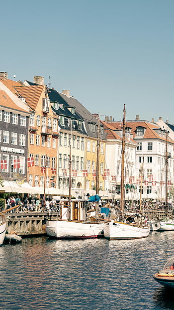 Nyhavn, Copenhagen, Denmark, colorful buildings, moored boats, canal, charming, waterfront, European architecture, tourist attraction, harbor