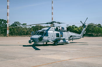 Gray Helicopter, Military helicopter, Brasília airstrip, clear blue sky, military aircraft, helicopter station, Brazilian military, aerial vehicle, defense equipment, aviation technology, military transport