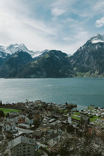 Lake Lucerne, Swiss Alps, aerial view, picturesque village, Switzerland, mountains, scenic landscape, Swiss landscape, alpine scenery, Swiss village, mountain lake