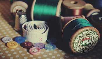 sewing kit, vintage sewing supplies, spools, buttons, tape measure, polka dot tablecloth, close-up photography, J&P Coats, Super Sheen, machine twist, 100 yards