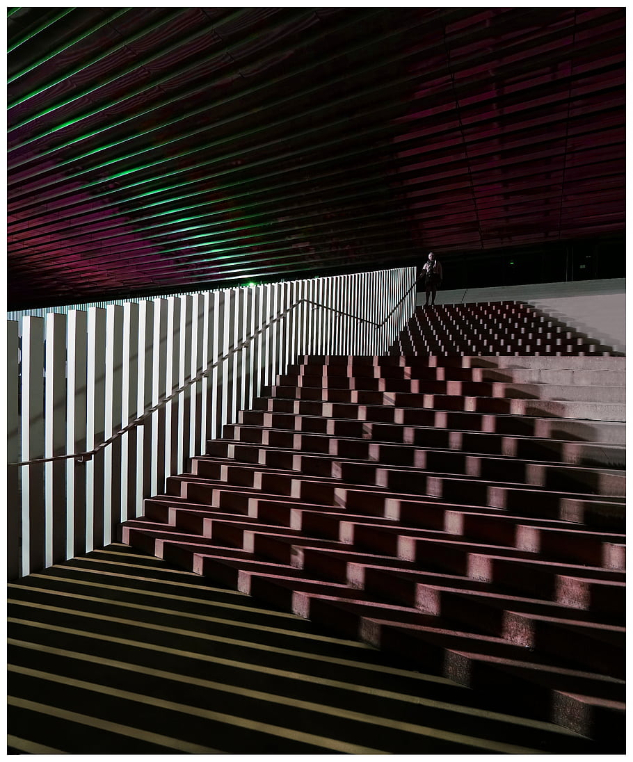 staircase, architecture, modern design, lighting, indoor, person, Rouen, France, Kindarena, geometric patterns, shadows