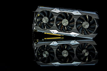 graphics card, cooling fans, close-up, modern graphics, black background, computer part, Zotac, high-performance, technology, hardware, gaming