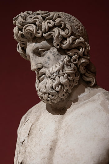Greek God Jupiter, ancient marble statue, intricate details, close-up, Greek god, marble sculpture, classical art, ancient Greece, mythological figure, historical artifact, cultural heritage