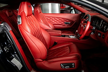 red leather car seat, luxury car interior, high-quality car seats, advanced car features, red leather seats, car interior design, luxury vehicle interior, red car seats, car seat comfort, car interior features, red leather upholstery