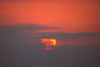 sunset, vibrant sunset, red hues, orange hues, dramatic sky, silhouette effect, cloud during sunset, sunset clouds, evening sky, colorful sunset, sunset scene