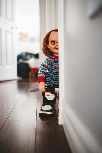 terrifying doll, knife, trendy gumshoe, hallway, evoking fear, home, scary doll, creepy doll, indoor scene, hallway view, doll with knife