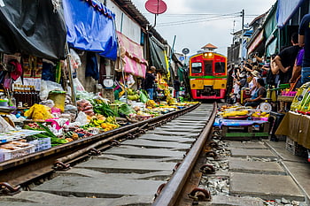 Maeklong Railway Market, Bangkok, Thailand, train passing, vibrant stalls, fresh produce, Mae Klong Market, railway market, street market, local market, train tracks