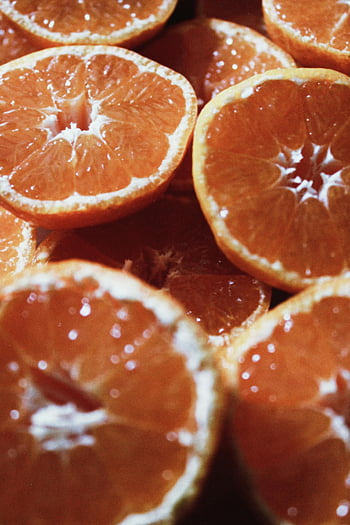 orange slices, close-up, vibrant, fresh oranges, juicy, nutritious, fruit, citrus, healthy, food photography, orange segments