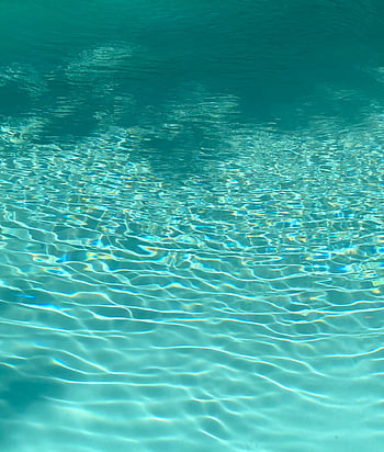 swimming pool, rippling water, turquoise water, gentle ripples, clear water, peaceful water, relaxing summer, pool surface, water texture, pool ripples, summer vibe