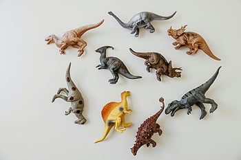 hračky dinosaurů, prehistorické hračky, Barevní dinosauři, ploché ležel, hračky postavy, světlé pozadí, hravé uspořádání, Postavy dinosaura, hračky dinosaury, prehistorické postavy, kolekce dinosaurů