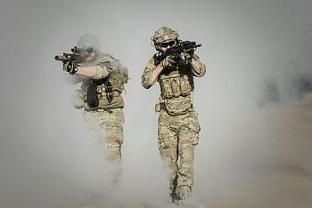soldier, camouflage shirt, camo uniforms, weapons, smoke-covered field, military action, advancing soldiers, combat gear, tactical gear, battlefield scene, armed troops