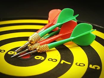 yellow and black dartboard, precision darts, bullseye, colorful dartboard, vibrant image, darts hitting, target practice, game of darts, dartboard illustration, green and red darts, bullseye hit
