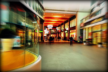 Centrum handlowe, Hoofddorp Holandia, żywe kolory, rozmycie w ruchu, Nowoczesne zakupy, żywą atmosferę, Struktura wewnętrzna, ludzie w środku, Środowisko detaliczne, przestrzeń komercyjna