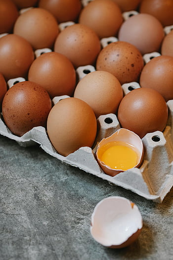 raw eggs, carton box, marble table, fresh brown eggs, natural food photography, egg yolk, egg shells, food photography, marble surface, carton, eggs