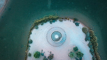 aerial view, artificial island, circular pattern, Dubai, drone shot, stunning view, unique design, top-down perspective, man-made island, coastal feature, waterfront structure