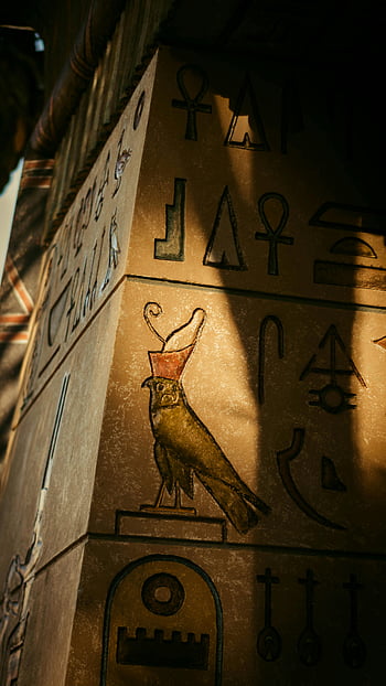 Egyptian hieroglyphs, Horus symbol, stone pillar, falcon depiction, ancient Egypt, shadowed hieroglyphs, Egyptian art, historical artifact, temple pillar, ancient symbols, Egyptian culture