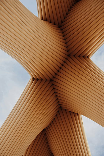 modern építészet, geometriai minták, mintás oszlopok, építészeti szerkezet, közeli nézet, egyedi kialakítás, kortárs design, absztrakt építészet, szerkezeti tervezés, építészeti részletek, modern design