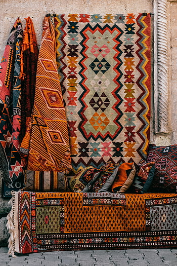 Turkish carpets, ornamental carpets, outdoor market, vivid patterns, beautifully arranged, Turkish rugs, market setting, colorful carpets, traditional carpets, decorative carpets, patterned carpets