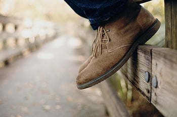 brown boots, suede boots, wooden rail, autumn feel, close-up photo, texture, fall fashion, outdoor style, casual footwear, boot details, fall season