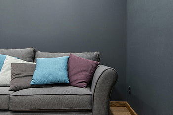 comfortable couch, colorful cushions, gray sofa, vibrant cushions, modern living room, stylish sofa, cozy sofa, living room furniture, home decor, interior design, comfortable seating