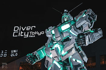 Large Humanoid Robot, DiverCity Tokyo Plaza, futuristic mecha robot, illuminated night sky, Tokyo Japan, shopping mall, Uniqlo, night scene, robot statue, futuristic design, mecha design