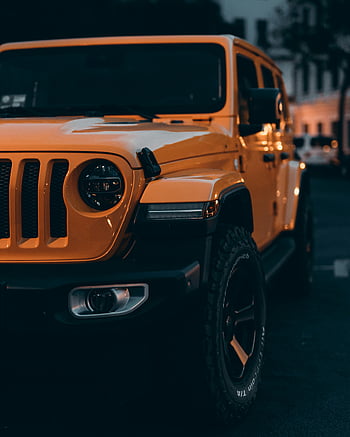 Jeep Wrangler Rubicon, bold yellow Jeep, city street, twilight, Dresden Germany, parked Jeep, urban vehicle, rugged tires, off-road vehicle, street scene, evening light