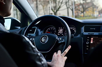 man driving, modern vehicle, town trip, close-up, interior dashboard, steering wheel, modern car, dashboard view, steering wheel control, car interior, urban driving