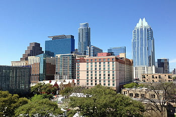 Austin skyline, concrete buildings, blue sky, modern architecture, downtown Austin, vibrant cityscape, towering skyscrapers, urban landscape, daytime city, city architecture, Texas city view