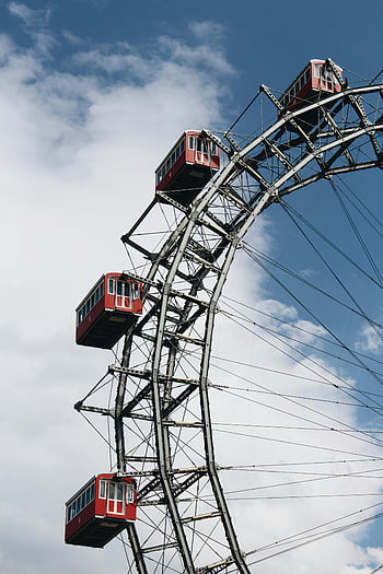 Vienna Giant Ferris Wheel, Viennese Giant Ferris Wheel, Austria, vibrant blue sky, iconic Ferris Wheel, striking view, amusement park, red cabins, Prater, Vienna attractions, European landmarks