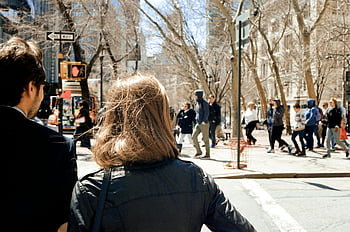 people walking, busy street, city pedestrians, sunny day, urban scene, street scene, city life, outdoor activity, public space, urban environment, daytime activity