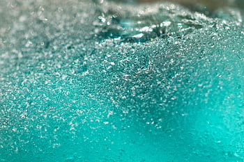 teal frosted glass, close-up texture, macro shot, abstract patterns, frost texture, glass surface, teal glass, frost patterns, glass frost, surface texture, macro texture