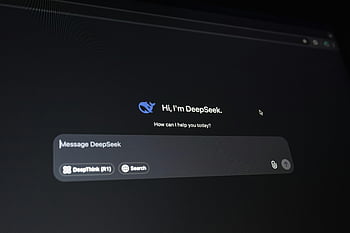 AI interface, dark screen display, digital assistant, AI technology, communication, close-up, DeepSeek, message input, user interface, technology interface, dark background