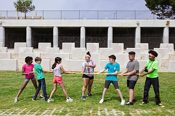 children playing tug of war, summer camp, outdoor activity, team building, kids, fun activity, group activity, tug of war, summer, camp, outdoors