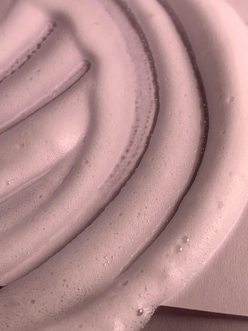 smooth foam, close-up, creamy texture, soft pink hue, abstract, foam texture, pink foam, close-up foam, smooth texture, creamy foam, abstract close-up