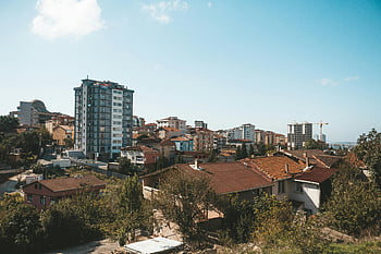 aerial photography, houses, urban cityscape, modern buildings, traditional buildings, clear sky, scenic view, rooftop, city architecture, residential area, city skyline
