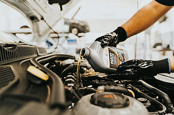 engine oil, pouring oil, car engine, mechanic, auto repair shop, close-up, engine maintenance, oil change, automotive service, car maintenance, engine care