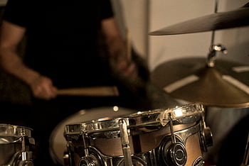 drummer, drum set, playing drums, rhythm, motion, focused shot, musical instrument, snare drum, cymbals, drumming, percussion