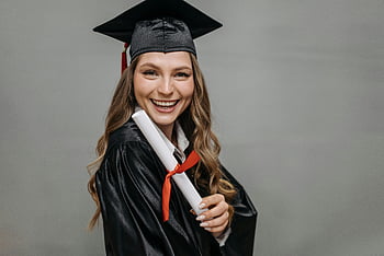 graduation, happy woman, diploma, academic achievement, graduation gown, graduation cap, celebrating, joyful, student, education, success