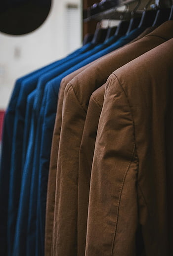 brown jackets, blue jackets, fashion, style, neatly arranged, hangers, showcase, clothing, outerwear, boutique, retail display