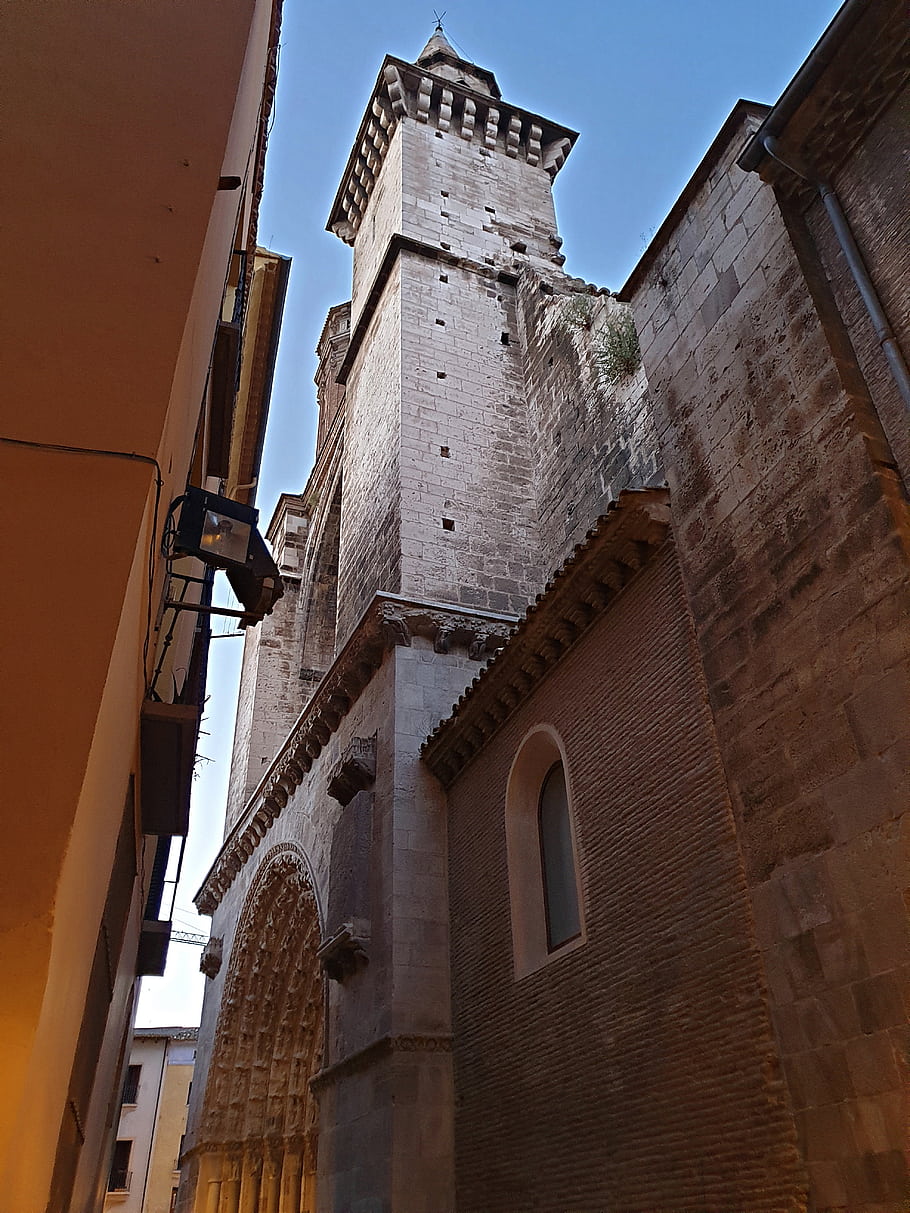 Tudela, Navarra, Spain, Cathedral, 12th century, architecture, stone tower, arched window, historic building, European cityscape, blue sky