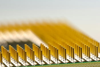 macro photography, processor pins, CPU microchip, golden pins, technology details, detailed macro shot, close-up technology, electronic components, semiconductor technology, microelectronics, hardware components