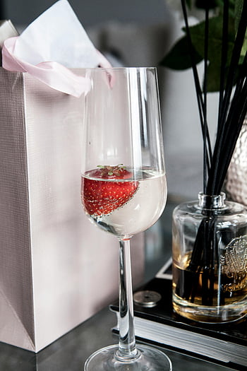 champagne glass, strawberry, celebrations, stylish glass, fresh strawberry, festive drink, elegant glassware, party drink, celebratory drink, champagne flute, fruit garnish